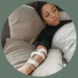 Woman resting while receiving supportive wellness care