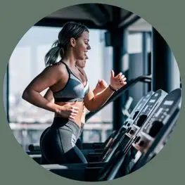 Woman exercising as part of a personalized wellness program